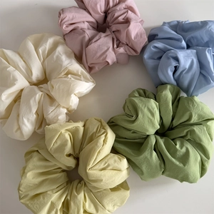 Set of 5 large pastel fabric scrunchies in cream, pink, blue, green, and yellow colors