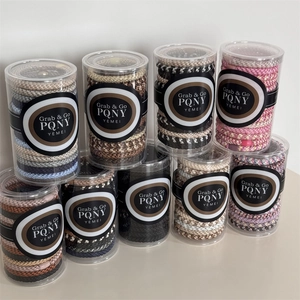 Detailed set of 9 cans with braided high-elasticity hair ties in assorted colors and textures
