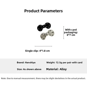 Polka dot bow hair clips in black and white alloy showing 4x1.8cm size dimensions
