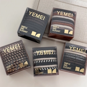 Set of 10 high-elasticity hair ties in earth-toned neutral colors in a premium gift box