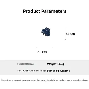 Detail of 2.5cm denim pattern acetate hair claw clip with specific size measurements