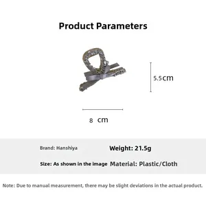 Detailed dimensions of the light gold shark clip with grey silk bow and tiny rhinestones