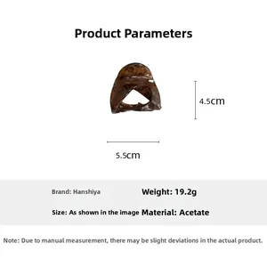Detail view of small tortoiseshell acetate hair claw clip with dimensions 5.5cm by 4.5cm