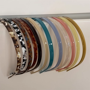 Set of 10 vintage acetate hairbands in various colors including tortoiseshell and marble patterns