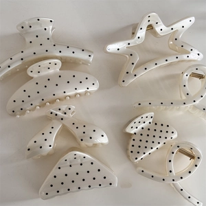 Elegant French style polka dot hair claw clips in various geometric shapes for women
