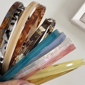 Handmade acetate hairbands set in leopard print and vibrant colors for stylish women