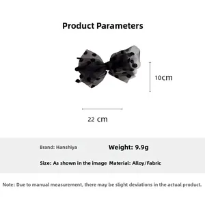 Polka dot mesh bow hair clip detail with dimensions 22x10cm and lightweight alloy design
