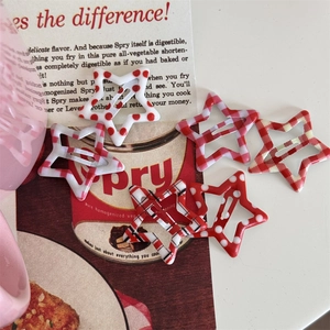 Set of 6 star-shaped hair clips featuring red and white gingham and polka dot patterns