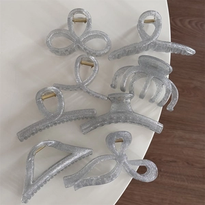 7-piece set of silver glitter hair claws in various shapes for elegant hair styling