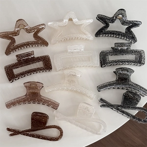 Star and square resin hair claws with marble texture in cream and coffee tones