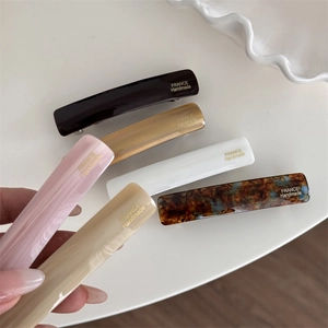 Elegant acetate spring hair clips in various colors with France Handmade gold lettering