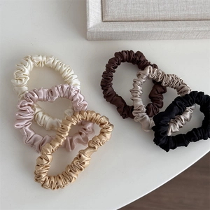 Set of six silk satin scrunchies in neutral earth tones with high gloss finish