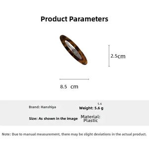 Detailed size specifications of an 8.5cm oval leopard print hair clip in brown resin