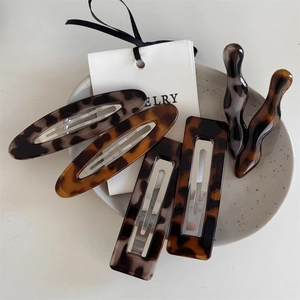 6-piece leopard print hair clip set with oval and rectangle designs in high-gloss resin