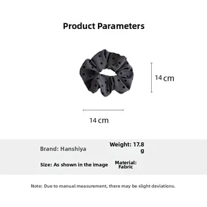Detailed view of 14cm grey polka dot hair scrunchie with dimensions and fabric weight