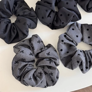 Polka dot and bow embroidered elastic hair scrunchies set in black and grey tones