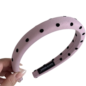 Serre-tête rembourré rose à pois noirs pour un style rétro doux et un look élégant
