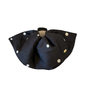 French style satin polka dot bow hair claw clip in black and white with gold brand tag
