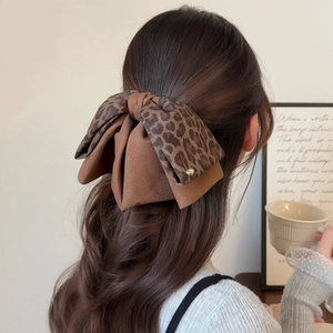 Retro leopard print bow hair claw clip for women with vintage metal button ornament