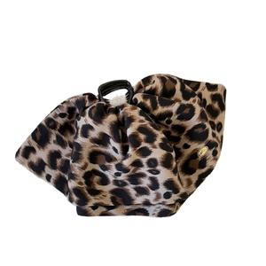 Retro leopard print hair claw clip with golden metal logo and soft fabric wrap decoration