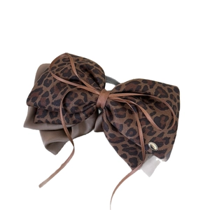 Elegant leopard print bow hair claw clip with double-layer fabric and golden metal accent