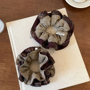 Two-pack brown contrast knit and plaid oversized scrunchies with handmade label