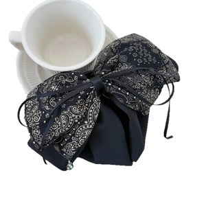 Elegant black paisley bow hair claw clip with crystal pendant for women's hairstyle