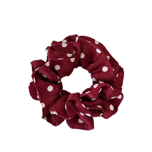 Elegant wine red polka dot scrunchie made of soft chiffon fabric for bun hairstyles