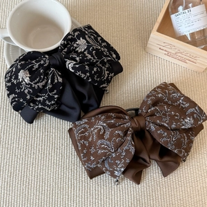 Lot de deux pinces à cheveux à nœuds en satin floral rétro noir et marron café