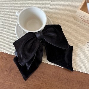 Elegant large black velvet bow hair clip in vintage French style for ponytail hairstyles