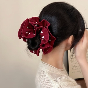 Double-layered wine red hair scrunchie with white polka dots and elegant ruffled edges