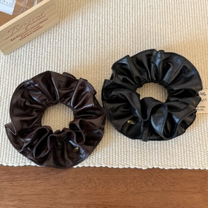 Brown and black faux leather scrunchies set with elegant gold metal tag accessories