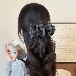 Retro black and grey checkered bow hair clip for women with elegant puffy fabric design