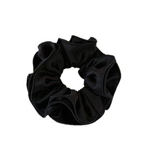 Elegant large black velvet scrunchie with layered pleats for stylish ponytails