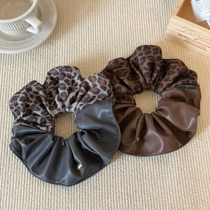 Maillard style leopard print and faux leather patchwork scrunchie with metal clasp