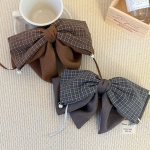 Maillard style oversized plaid bow hair clips with pearls and fabric patchwork design
