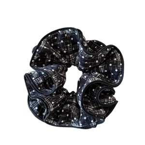 Elegant black and white polka dot and grid pattern scrunchie for hair styling
