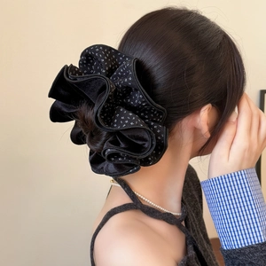 Elegant black velvet floral scrunchie hair accessory with white polka dots for high ponytails