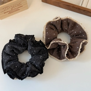 French retro style polka dot knitted scrunchies with elegant layered ruffles in brown and gray