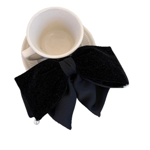 Elegant black velvet double-layer bow hair clip featuring pearl charms on white background