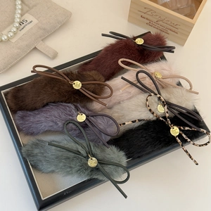 Elegant plush ribbon hair clips in various colors with gold charms for autumn and winter
