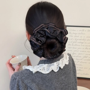 Elegant paisley print oversized scrunchie in black and pink for bun hairstyles