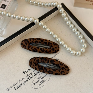 Eleganti fermagli per capelli ovali con stampa leopardata in scamosciato stile vintage