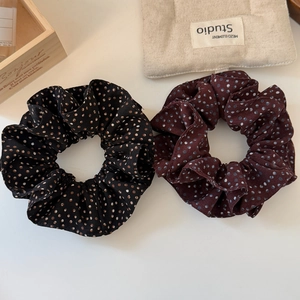 Set of two elegant polka dot scrunchies in black and burgundy textured fabric