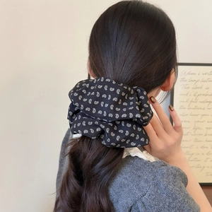 Large black paisley scrunchie for women with classic beige vintage pattern on ponytail