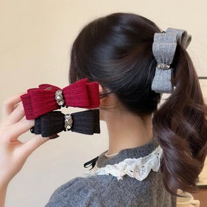 Elegant knit bow banana clip with rhinestone flower in red, black, and grey colors