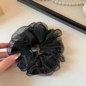 Elegant black tulle scrunchie with sparkling silver rhinestones in a ruffled design