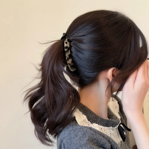 Classic black and white tortoiseshell acetate banana clip for thick ponytail styling