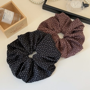 Floral print scrunchies set in black and brown fabric with a soft vintage texture