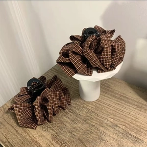 Elegant houndstooth fabric claw clips set in brown and pink for stylish hair styling